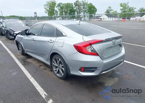 2019 Honda Civic Touring z USA, uszkodzony, nr VIN 19XFC1F91KE202367